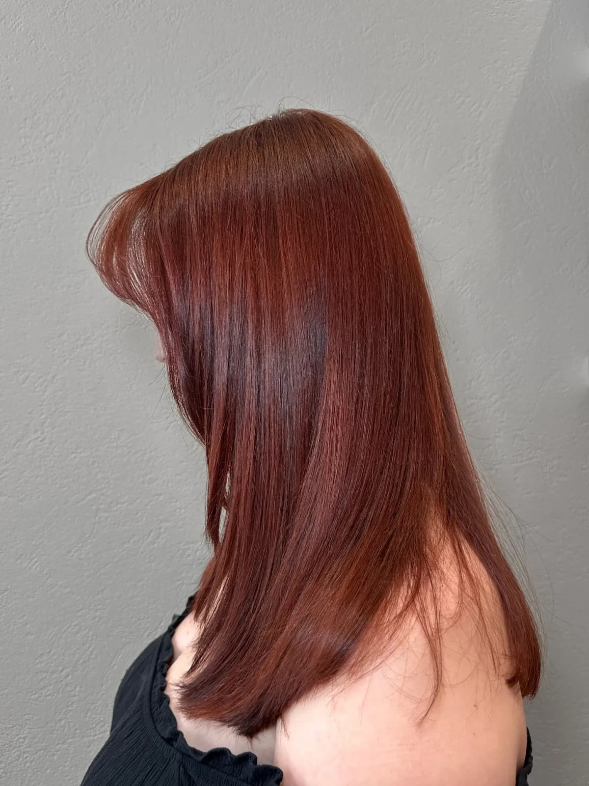 Pose d’extensions capillaires au salon Maison Voineau